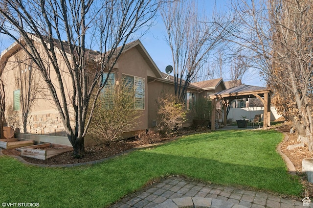 672 W 1900 S, Syracuse, UT 84075 - exterior space with a gazebo, a patio area, stucco siding, and a yard