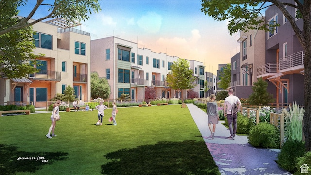 surrounding community featuring a lawn