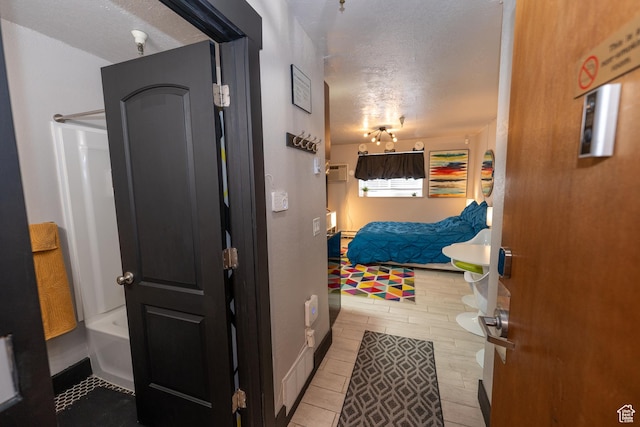1940 Prospector Ave Unit 108, Park City, UT 84060 - bedroom with a textured ceiling
