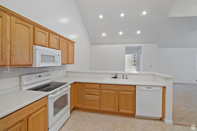 131 S 1900 W Unit U2, Lehi, UT 84043 - kitchen featuring light countertops, vaulted ceiling, a peninsula, white appliances, and a sink