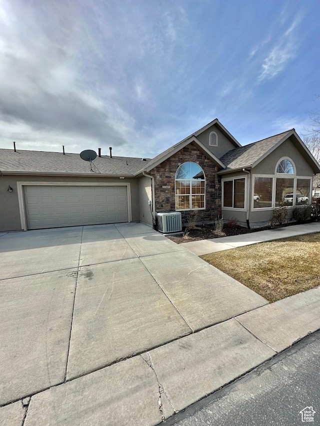 131 S 1900 W Unit U2, Lehi, UT 84043 - ranch-style home featuring stucco siding, an attached garage, concrete driveway, and central AC