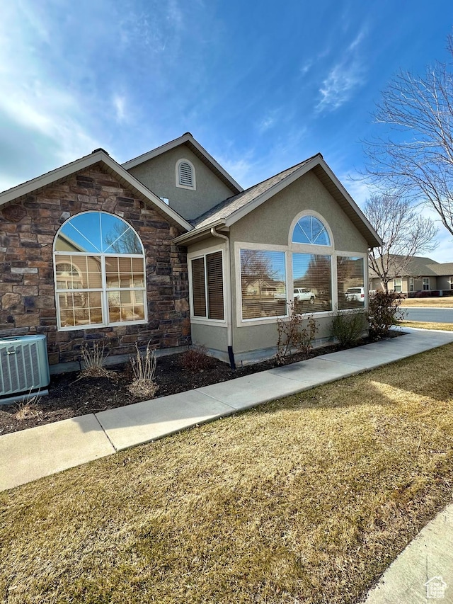131 S 1900 W Unit U2, Lehi, UT 84043 - single story home featuring stone siding, stucco siding, and cooling unit