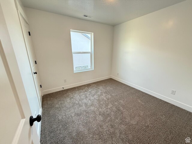1949 S Freestone Blvd Unit 417, Santaquin, UT 84655 - unfurnished room featuring dark carpet and baseboards
