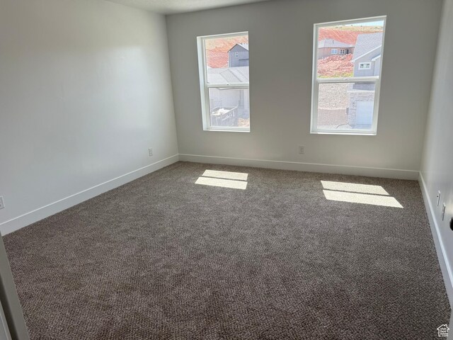1949 S Freestone Blvd Unit 417, Santaquin, UT 84655 - carpeted spare room featuring plenty of natural light and baseboards