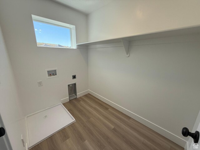 1949 S Freestone Blvd Unit 417, Santaquin, UT 84655 - washroom with washer hookup, wood finished floors, electric dryer hookup, and baseboards