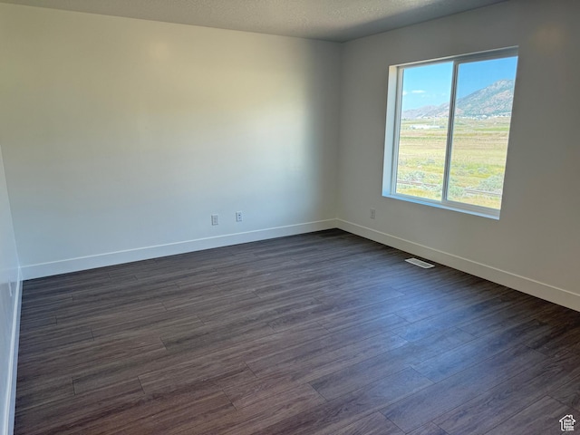 1949 S Freestone Blvd Unit 417, Santaquin, UT 84655 - empty room with baseboards and dark wood-style floors