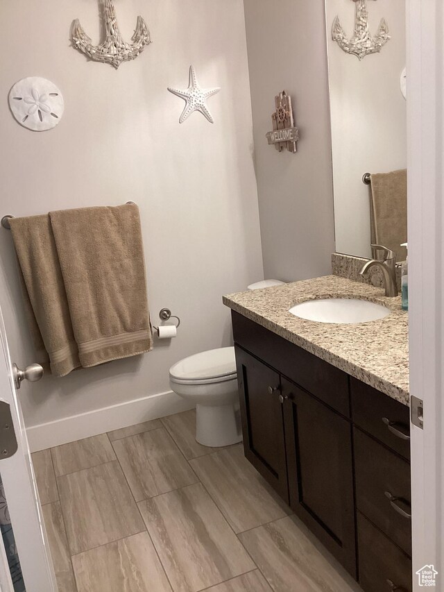 263 E Somerest Ln N, Stansbury Park, UT 84074 - bathroom with vanity and toilet