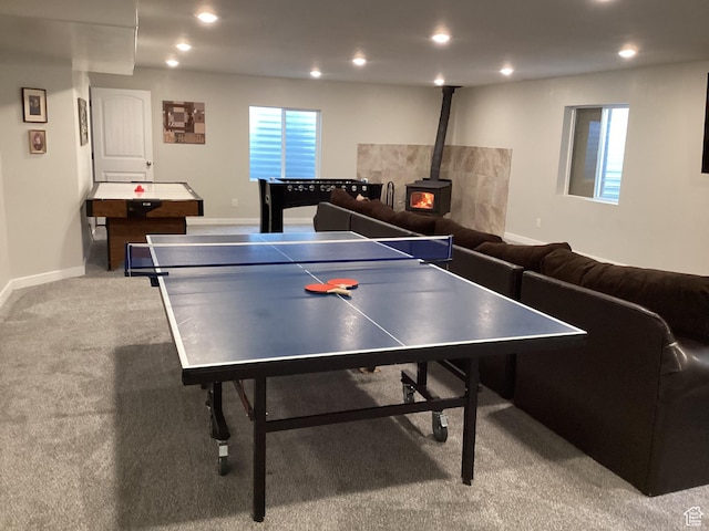 263 E Somerest Ln N, Stansbury Park, UT 84074 - playroom featuring light carpet and a wood stove