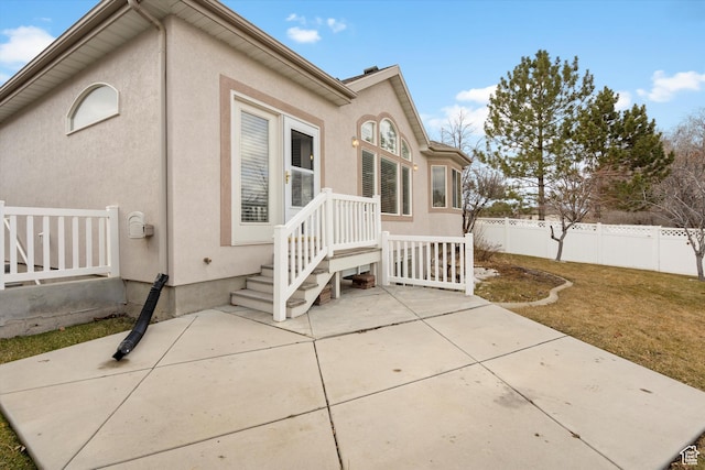 exterior space with a yard and a patio area