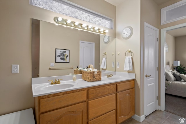 bathroom featuring tile patterned floors and vanity