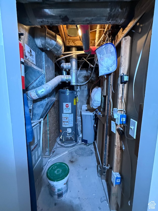 utility room with gas water heater