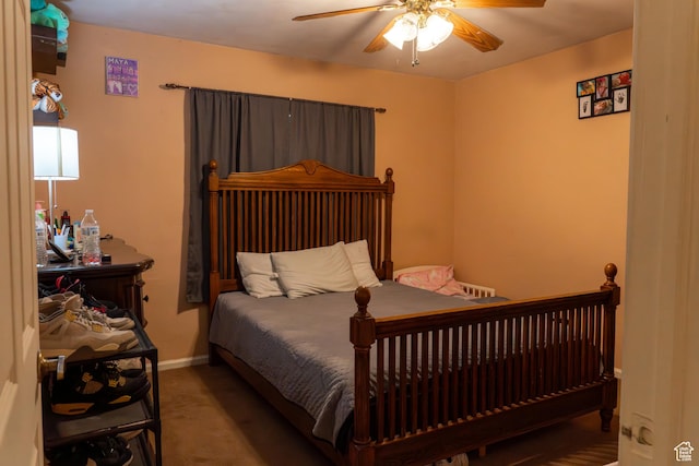 carpeted bedroom featuring ceiling fan