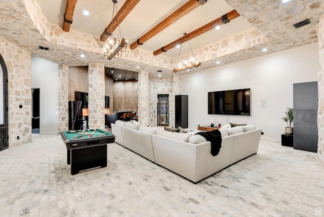 2836 S 2300th Cir E, St George, UT 84790 - living room with visible vents, arched walkways, beamed ceiling, pool table, and a high ceiling