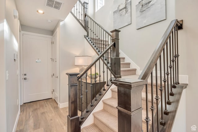 3791 S 3235 W Unit 15, West Haven, UT 84401 - staircase with hardwood / wood-style flooring and a high ceiling