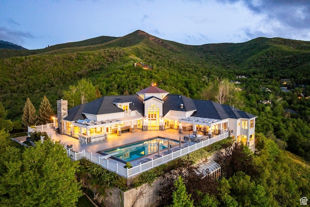 2845 S Wood Hollow Way, Bountiful, UT 84010 - view from above of property with a heavily wooded area, mountains, and a pool area
