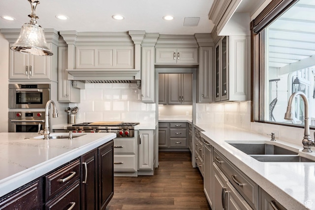 2845 S Wood Hollow Way, Bountiful, UT 84010 - kitchen with a sink, stainless steel appliances, recessed lighting, light stone counters, and plenty of natural light