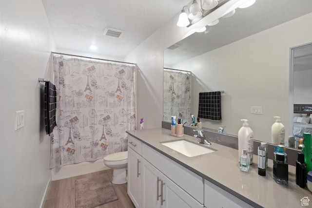 3788 W Soft Whisper Way, Herriman, UT 84096 - full bathroom featuring shower / bath combo, hardwood / wood-style flooring, toilet, and vanity