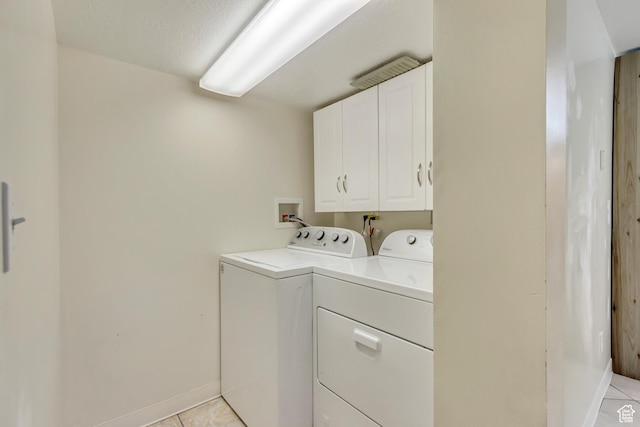 3780 W 5850 S, Roy, UT 84067 - washroom with washing machine and clothes dryer, light tile patterned flooring, and cabinets