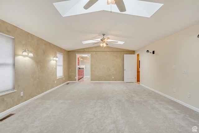3780 W 5850 S, Roy, UT 84067 - carpeted spare room with ceiling fan and lofted ceiling with skylight