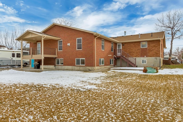 3780 W 5850 S, Roy, UT 84067 - snow covered property featuring a balcony
