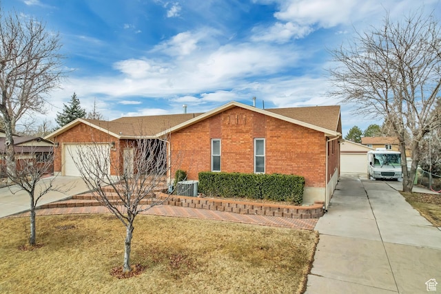 3780 W 5850 S, Roy, UT 84067 - ranch-style house with a garage, central air condition unit, and a front lawn