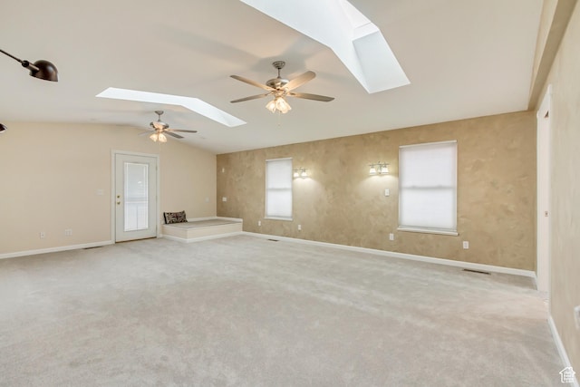 3780 W 5850 S, Roy, UT 84067 - carpeted empty room featuring ceiling fan and lofted ceiling with skylight