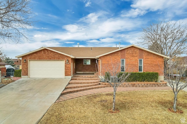 ranch-style house featuring a front lawn and a garage