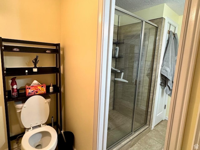 4547 S 1250 W, Riverdale, UT 84405 - full bath featuring a textured ceiling, a shower stall, and tile patterned floors