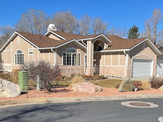 4547 S 1250 W, Riverdale, UT 84405 - ranch-style home featuring a chimney, stucco siding, a shingled roof, concrete driveway, and an attached garage