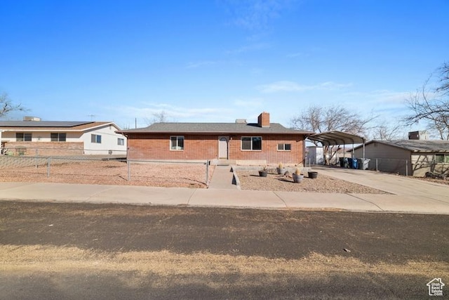 single story home with a carport