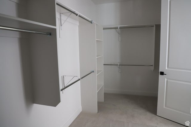 2895 E Liam Ln Unit 106, Eagle Mountain, UT 84005 - walk in closet with carpet flooring