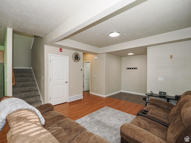 7058 S Greensand Dr, West Jordan, UT 84084 - living room featuring hardwood / wood-style floors and a textured ceiling