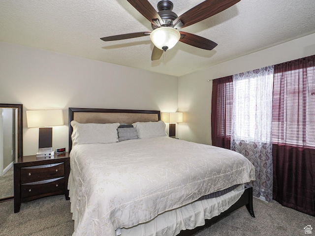 7058 S Greensand Dr, West Jordan, UT 84084 - carpeted bedroom featuring a textured ceiling and ceiling fan