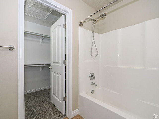 7058 S Greensand Dr, West Jordan, UT 84084 - bathroom with tub / shower combination and a textured ceiling