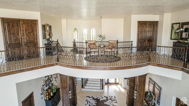 2024 W 450th Cir S, St George, UT 84770 - interior space with a wealth of natural light, a textured ceiling, and a towering ceiling