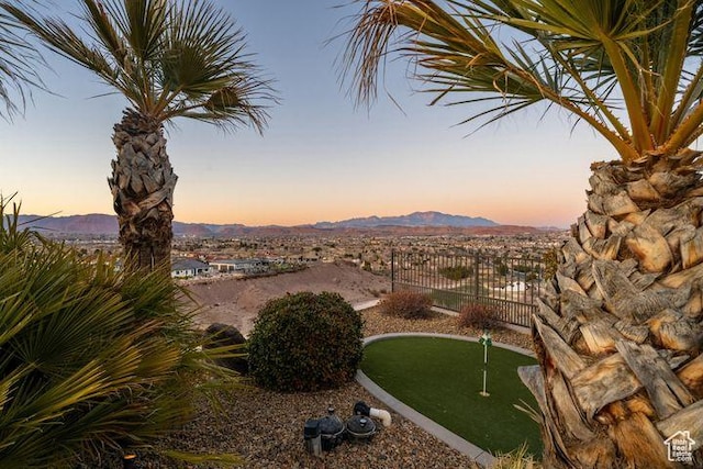 2024 W 450th Cir S, St George, UT 84770 - yard at dusk featuring fence and a mountain view