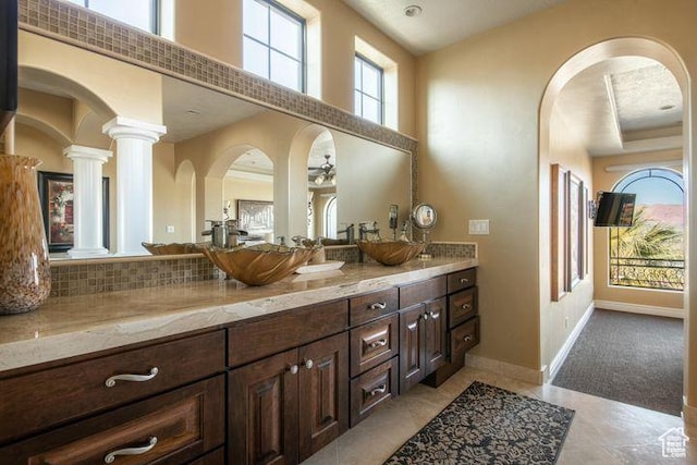 2024 W 450th Cir S, St George, UT 84770 - bathroom with a towering ceiling, a sink, double vanity, and ornate columns