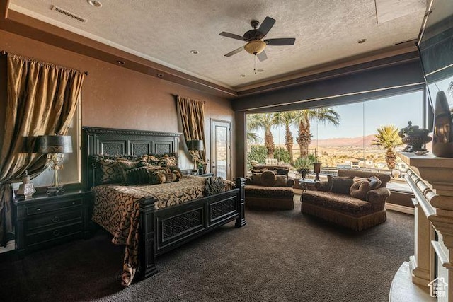 2024 W 450th Cir S, St George, UT 84770 - bedroom featuring dark carpet, ceiling fan, a textured ceiling, and visible vents