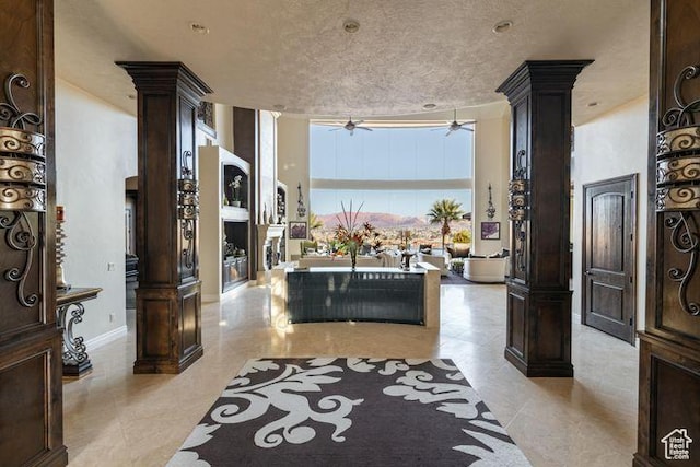 2024 W 450th Cir S, St George, UT 84770 - hall with baseboards, floor to ceiling windows, and ornate columns