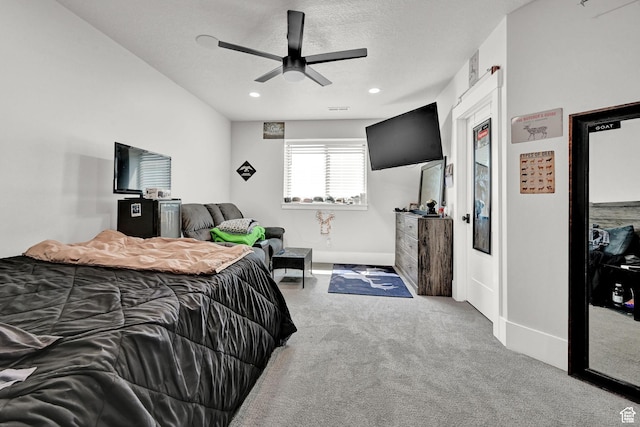 2673 S 4950 W, Taylor, UT 84401 - bedroom with baseboards, a textured ceiling, a ceiling fan, and carpet flooring