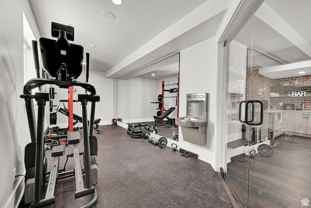 2673 S 4950 W, Taylor, UT 84401 - exercise area with baseboards and brick wall