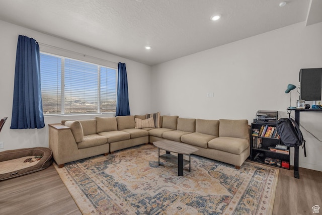 1982 N Red Yearling Dr, Saratoga Springs, UT 84045 - living area featuring wood finished floors, a textured ceiling, and recessed lighting