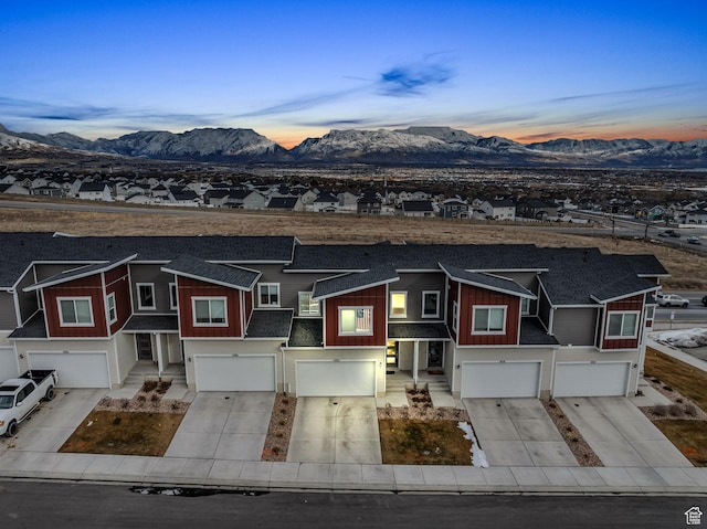 1982 N Red Yearling Dr, Saratoga Springs, UT 84045 - view of front facade featuring a garage, driveway, and a mountain view