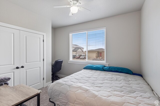 4142 N Fairfield Dr, Eagle Mountain, UT 84005 - bedroom featuring baseboards, a closet, a ceiling fan, and light colored carpet