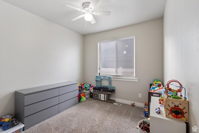 4142 N Fairfield Dr, Eagle Mountain, UT 84005 - recreation room with carpet, visible vents, baseboards, and a ceiling fan