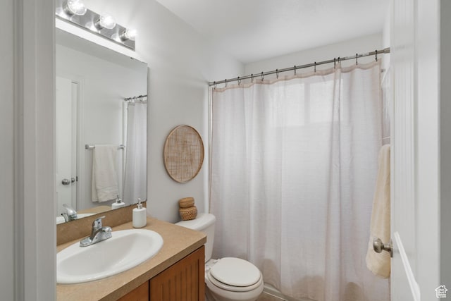 full bath with toilet and vanity