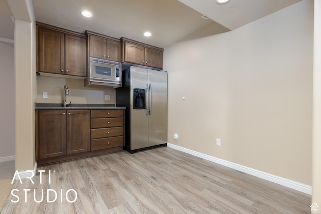 3013 W Alta Peak Rd, South Jordan, UT 84095 - kitchen featuring light wood finished floors, stainless steel appliances, recessed lighting, dark brown cabinetry, and baseboards