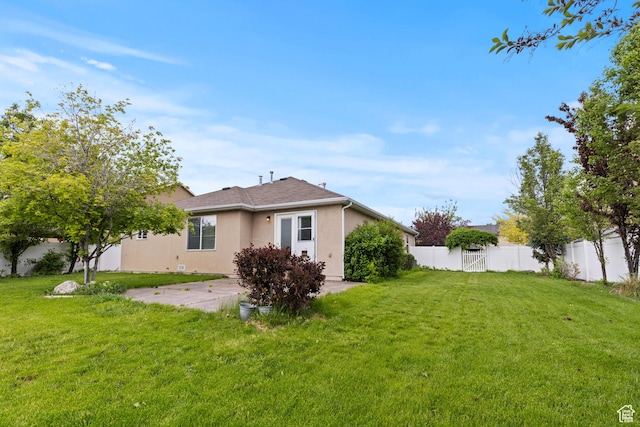 298 Beaumont Dr, Kaysville, UT 84037 - back of house with stucco siding and a patio area