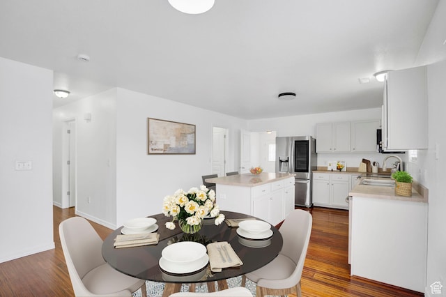 298 Beaumont Dr, Kaysville, UT 84037 - dining area featuring dark wood finished floors and baseboards