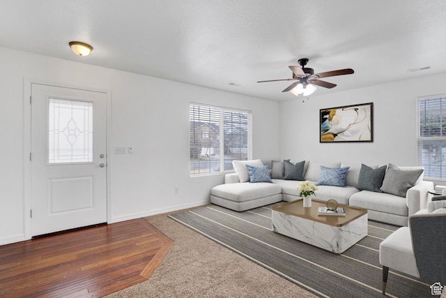 298 Beaumont Dr, Kaysville, UT 84037 - carpeted living area with plenty of natural light, ceiling fan, and baseboards